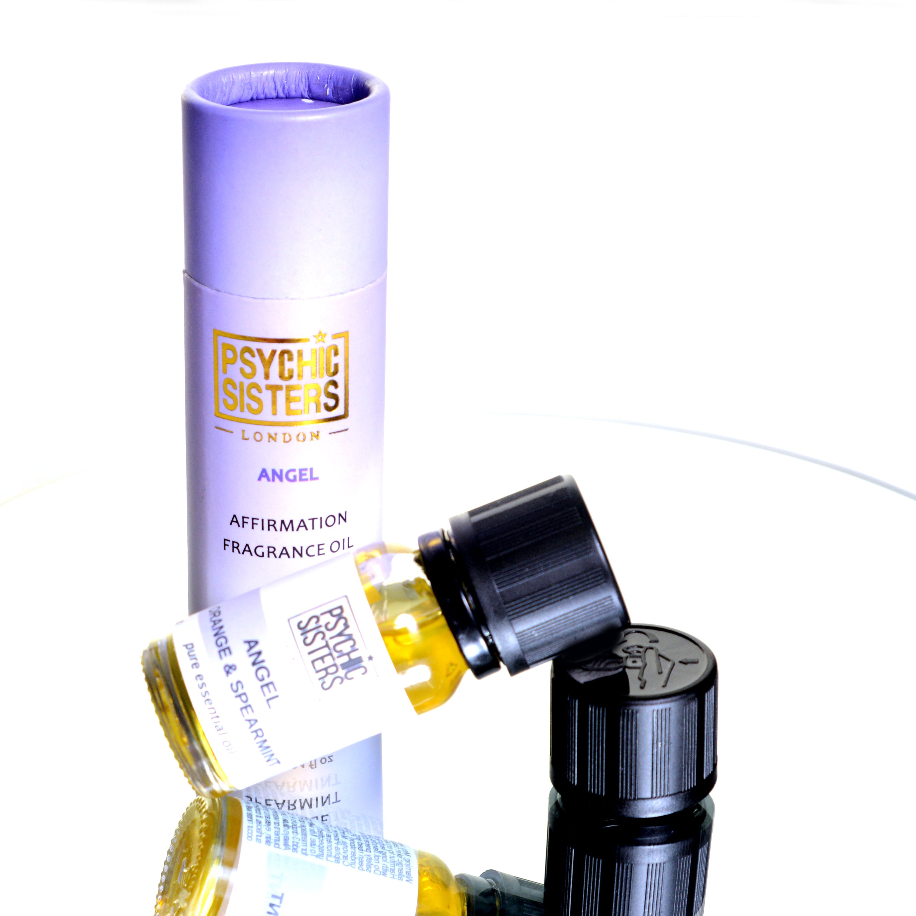 Angel fragrance oil with affirmation by Psychic Sisters, showcasing the bottle and packaging.